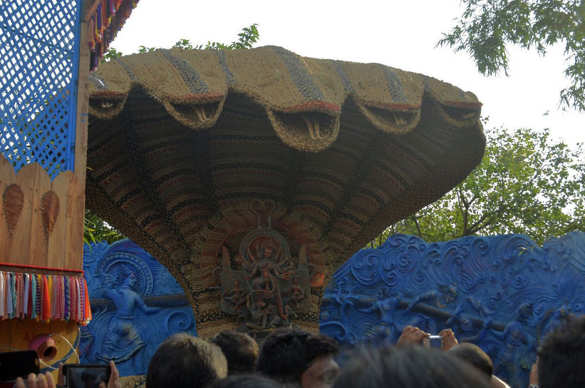 A distant view of the idol, first Puja pandal